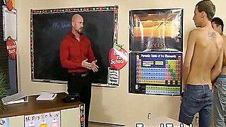 Young students pounded in the classroom by hunky teacher - gayxo.com